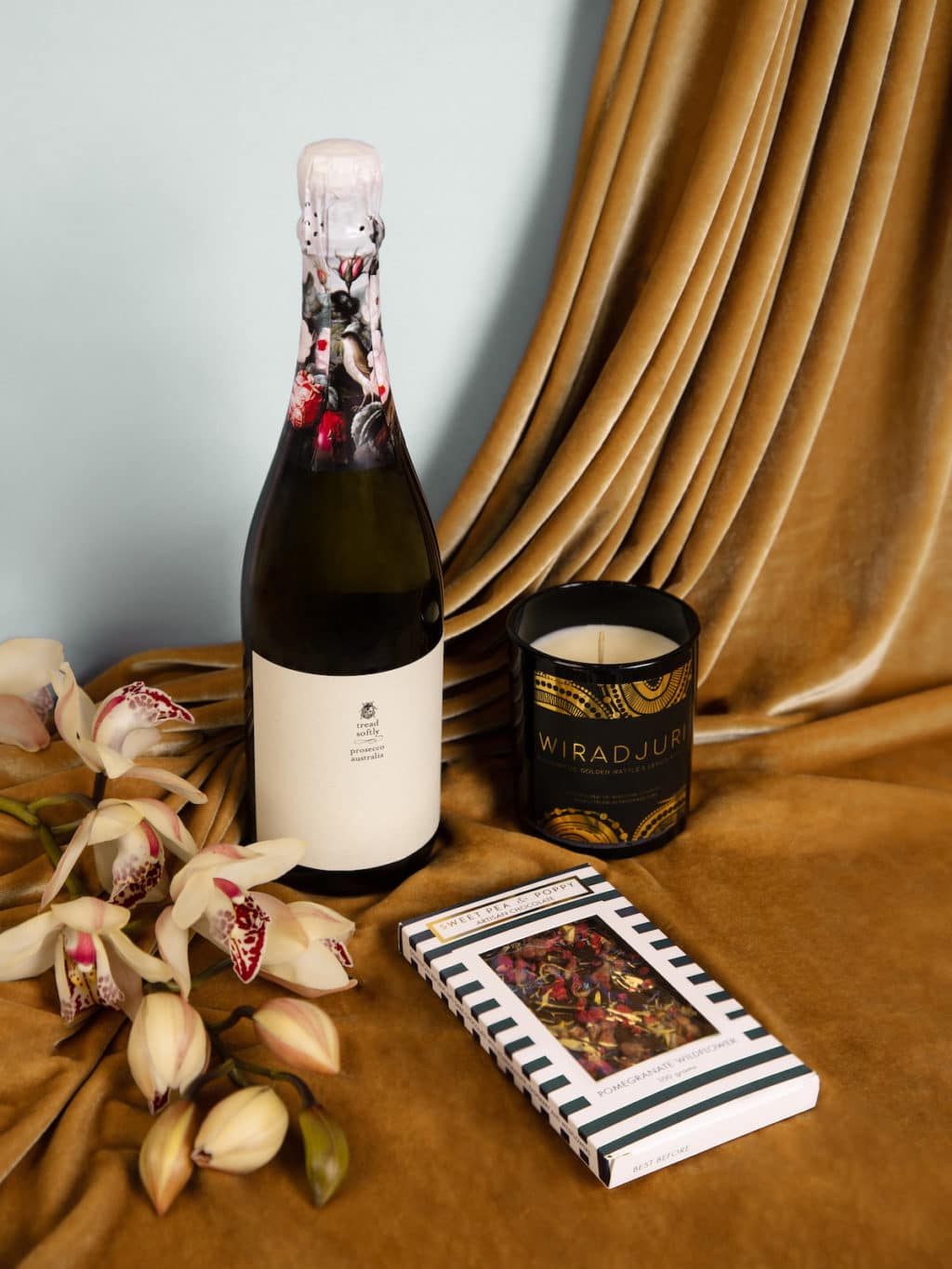 Champagne, chocolate and candle from our hamper, available to add to a flower delivery from our wagga Wagga florist shop.